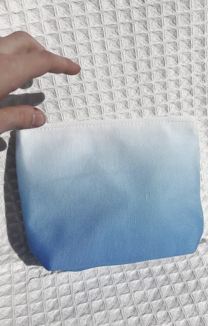 Toilettipussi Sunset sininen liukuvärjätty 22 x 16cm